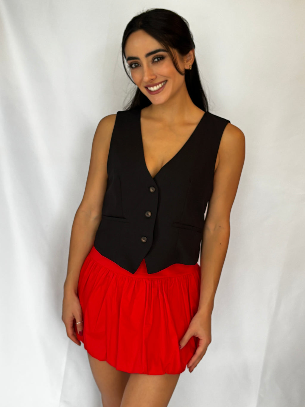 Chaleco negro con espalda descubierta